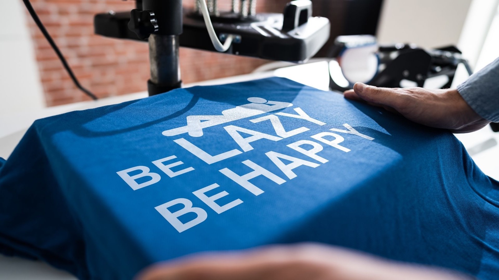 Custom apparel printing in Lafayette IN with blue shirt press
