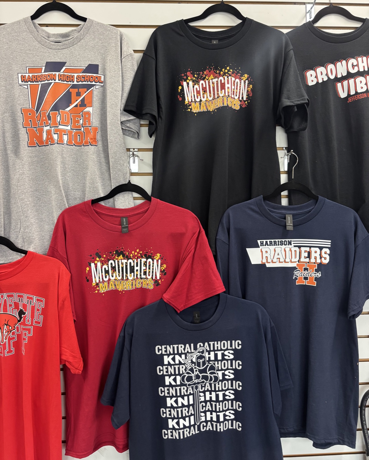 Promotional school shirt display at CustomTees